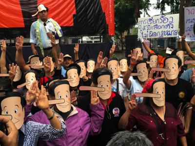 thai activists in pinocchio masks call junta leader liar thai activists in pinocchio masks call junta leader liar
