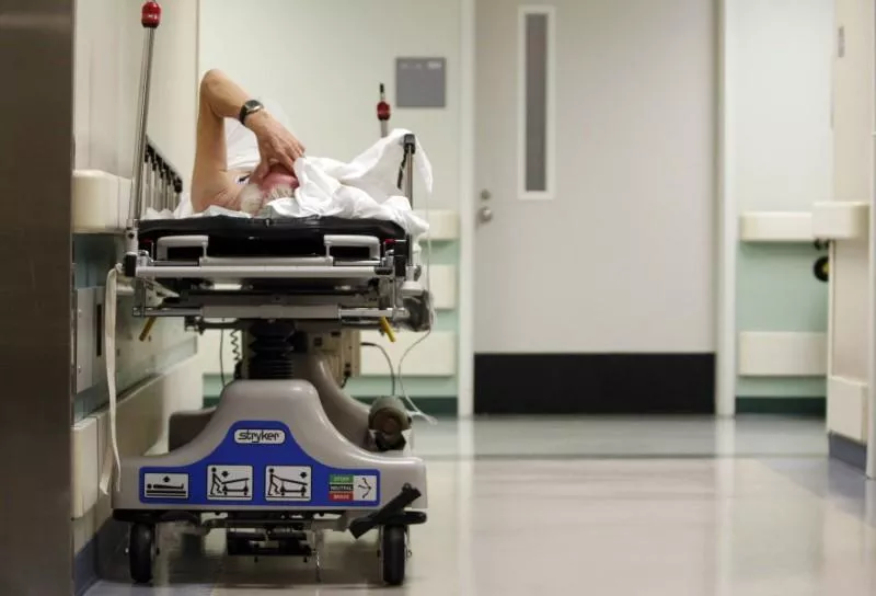 a patient waits in the hallway of a hospital photo reuters a patient waits in the hallway of a hospital photo reuters