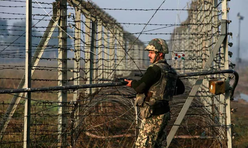 an indian border security force bsf soldier patrols near the fenced border with pakistan in suchetgarh southwest of jammu january 11 2013 photo reuters an indian border security force bsf soldier patrols near the fenced border with pakistan in suchetgarh southwest of jammu january 11 2013 photo reuters