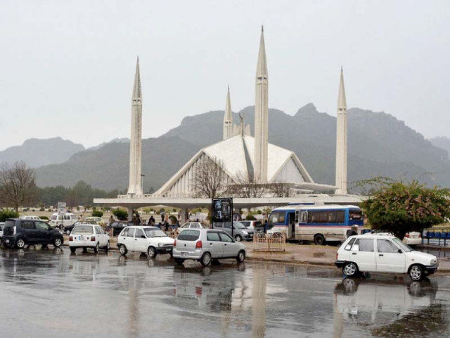 vehicles of picnickers seen parked near faisal mosque photo inp vehicles of picnickers seen parked near faisal mosque photo inp
