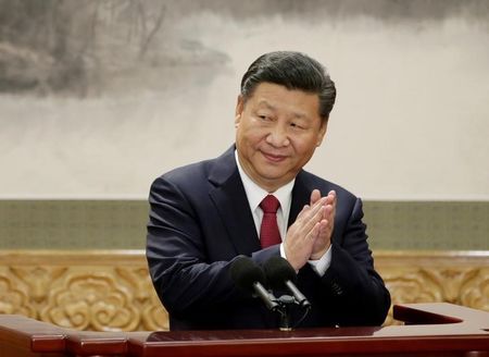 china 039 s president xi jinping claps after his speech as he and other new politburo standing committee members meet with the press at the great hall of the people in beijing photo reuters