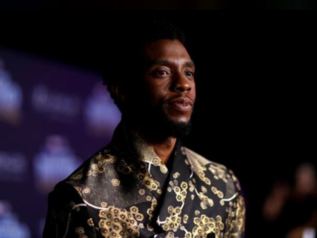 Cast member Chadwick Boseman poses at the premiere of 