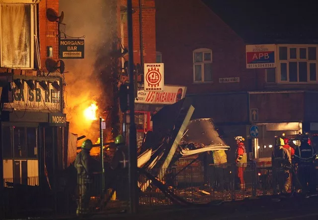 members of the emergency services work at the site of an explosion which destroyed a convenience store and a home in leicester britain february 25 2018 photo reuters members of the emergency services work at the site of an explosion which destroyed a convenience store and a home in leicester britain february 25 2018 photo reuters