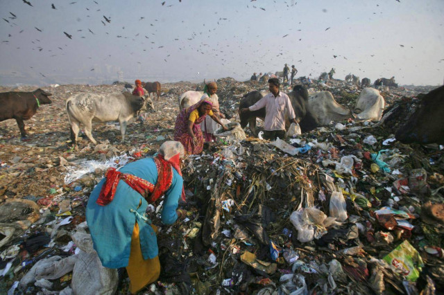 waste collectors search for recyclable material at the ghazipur landfill in new delhi photo reuters waste collectors search for recyclable material at the ghazipur landfill in new delhi photo reuters