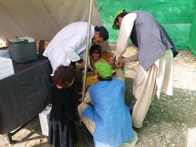 polio drops being administered photo express