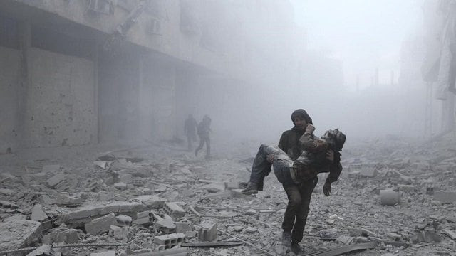 a wounded man is carried following an air strike on the rebel held besieged town of arbin in the eastern ghouta region on the outskirts of the capital damascus on january 2 2018 photo reuters a wounded man is carried following an air strike on the rebel held besieged town of arbin in the eastern ghouta region on the outskirts of the capital damascus on january 2 2018 photo reuters