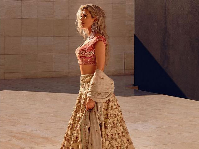 kim kardashian channels her inner bollywood dulhan for vogue india
