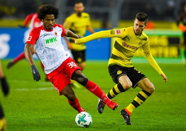augsburg 039 s brazilian midfielder caiuby r and dortmund 039 s german midfielder julian weigl vie for the ball during the german first division bundesliga football match borussia dortmund vs fc augsburg in dortmund western germany on february 26 2018 photo afp augsburg 039 s brazilian midfielder caiuby r and dortmund 039 s german midfielder julian weigl vie for the ball during the german first division bundesliga football match borussia dortmund vs fc augsburg in dortmund western germany on february 26 2018 photo afp