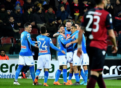 napoli go four points clear at top with cagliari rout