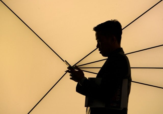 a person uses a smartphone at the mobile world congress mwc the world 039 s biggest mobile fair on february 26 2018 in barcelona the mobile world congress is held in barcelona from february 26 to march 1 photo afp a person uses a smartphone at the mobile world congress mwc the world 039 s biggest mobile fair on february 26 2018 in barcelona the mobile world congress is held in barcelona from february 26 to march 1 photo afp