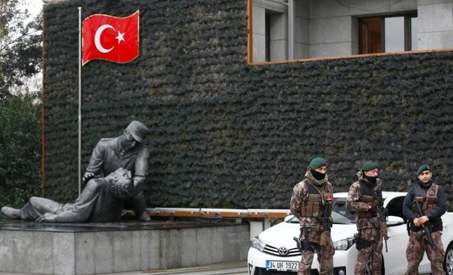 photo showing members of turkish police speciasl forces standing guard at the police headquarters in istanbul turkey jan 17 photo reuters