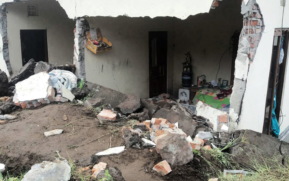 an avalanche of mud and rock cascaded down a steep slope burying victims as they worked photo afp