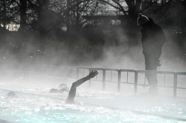 the arctic blast did not stop swimmers from diving into an outdoor pool in strasbourg photo afp the arctic blast did not stop swimmers from diving into an outdoor pool in strasbourg photo afp