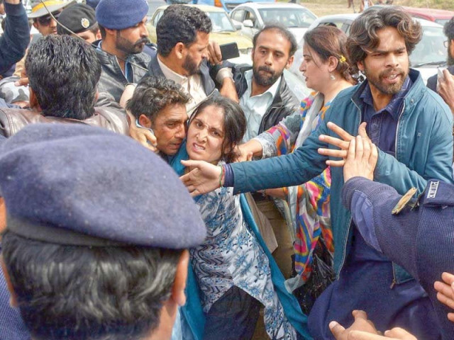 protesting teachers react as police try to drag away one of their colleagues photo inp protesting teachers react as police try to drag away one of their colleagues photo inp