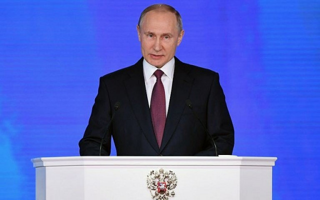 russian president vladimir putin addresses the federal assembly at moscow s manezh exhibition center photo afp russian president vladimir putin addresses the federal assembly at moscow s manezh exhibition center photo afp