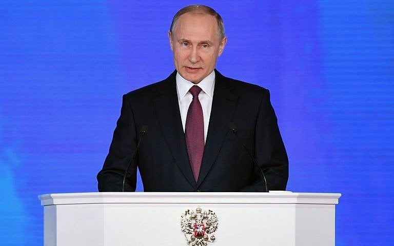 russian president vladimir putin addresses the federal assembly at moscow s manezh exhibition center photo afp