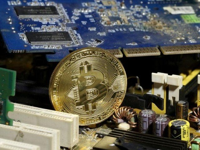 a copy of bitcoin standing on pc motherboard is seen in this illustration picture october 26 2017 photo reuters