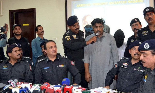a suspected terrorist talks to the media at the press conference photo app