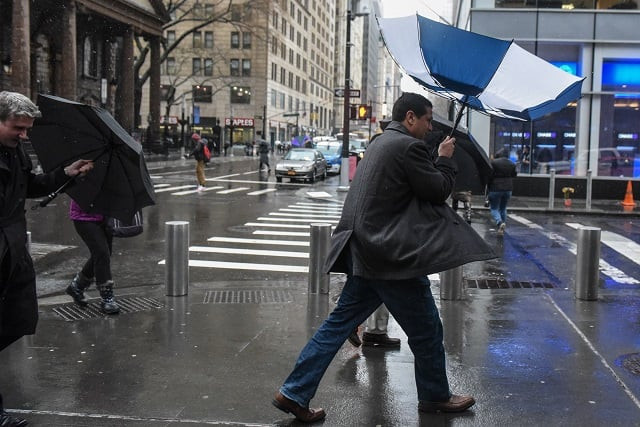 a person struggles with their umbrella during a large storm on march 2 2018 in new york new york a nor 039 easter is set to slam the east coast on friday bringing coastal flooding heavy snow and strong winds to the area photo afp a person struggles with their umbrella during a large storm on march 2 2018 in new york new york a nor 039 easter is set to slam the east coast on friday bringing coastal flooding heavy snow and strong winds to the area photo afp