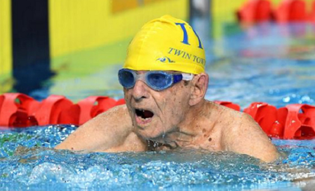 photo shows 99 year old george corones of australia who broke what is claimed to be the 50 meter long course freestyle world record for his age group photo afp