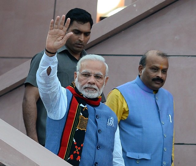 indian prime minister narendra modi c waves during the state election results of three northeast states at the bjp headquarters in the indian capital new delhi on march 3 2018 photo afp