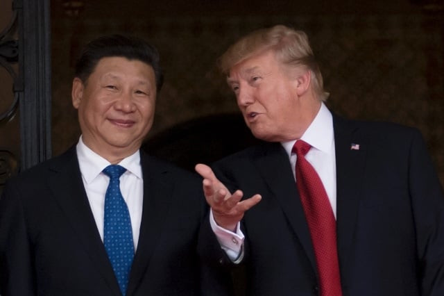 chinese president xi jinping and us president donald trump during their summit at the mar a lago resort in florida photo afp chinese president xi jinping and us president donald trump during their summit at the mar a lago resort in florida photo afp