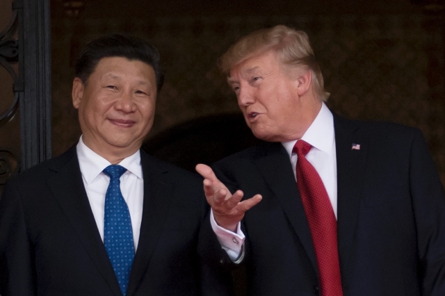 chinese president xi jinping and us president donald trump during their summit at the mar a lago resort in florida photo afp