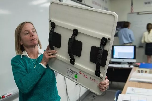 the bulletproof whiteboard can also serve as a shield to save the lives of her students photo afp the bulletproof whiteboard can also serve as a shield to save the lives of her students photo afp