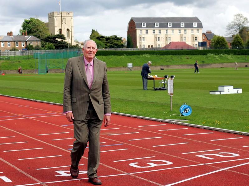 sir roger bannister walks over the same finish line at the iffley road running track in oxford that he crossed fifty years ago when he was the first man to run the sub four minute mile photo reuters