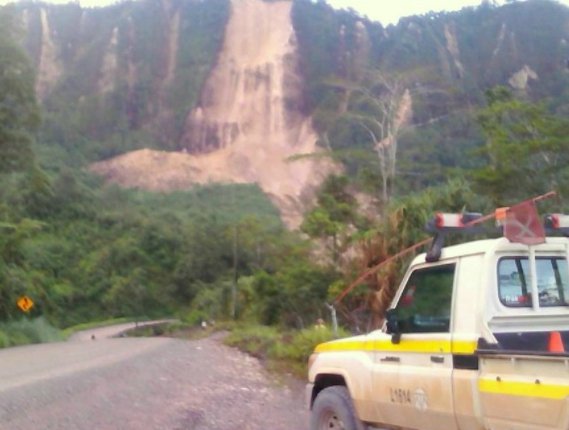 a supplied image shows locals inspecting a landslide and damage to a road located near the township of tabubil after an earthquake that struck papua new guinea 039 s southern highlands february 26 2018 photo reuters file