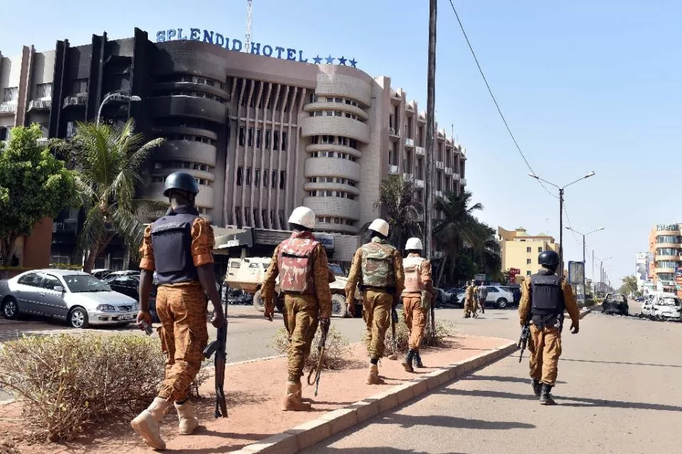 burkina faso troops patrol outside the splendid hotel and nearby cappuccino restaurant following a jihadist attack in ouagadougou on january 16 2016 photo afp burkina faso troops patrol outside the splendid hotel and nearby cappuccino restaurant following a jihadist attack in ouagadougou on january 16 2016 photo afp