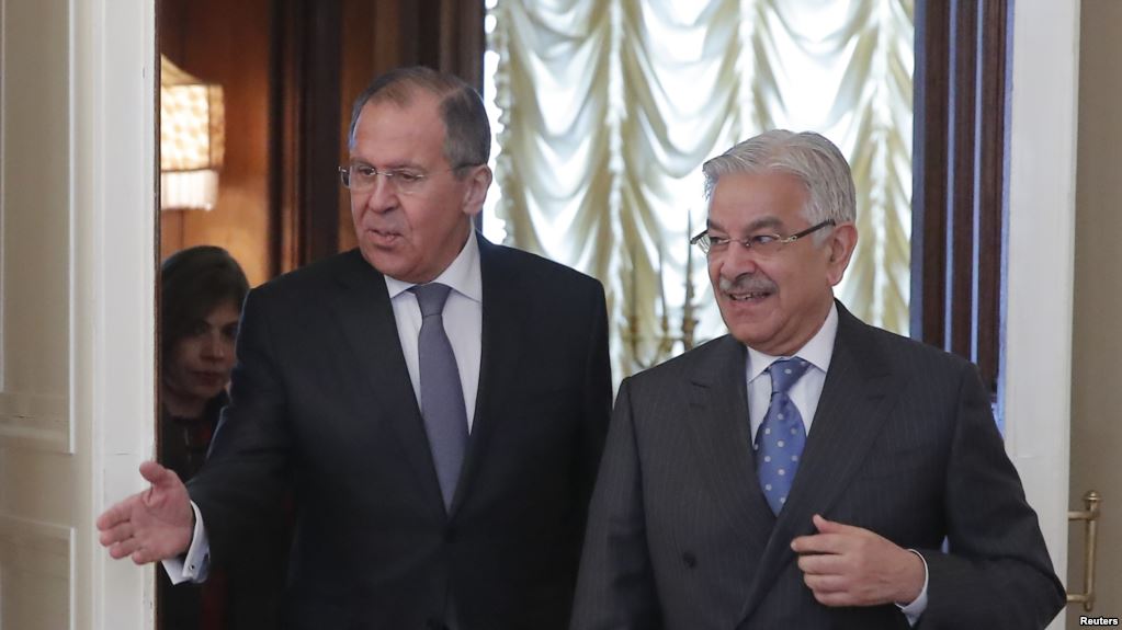 russian foreign minister sergei lavrov shows the way to his pakistani counterpart khawaja asif during a meeting in moscow photo reuters