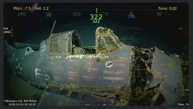 the search team also released pictures and video of parts of the ship including a nameplate and anti aircraft guns covered in decades of slime photo courtesy paul allen