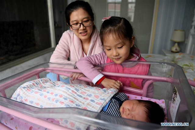 chinese moms think twice on second child photo xinhua