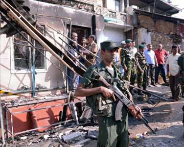 rioters clash with police in curfew bound central sri lanka