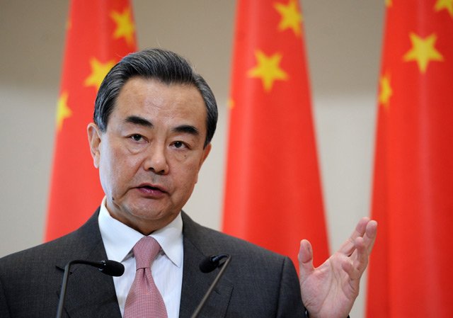 yi stresses quot the sincerity quot of all parties to solve the nuclear crisis photo afp