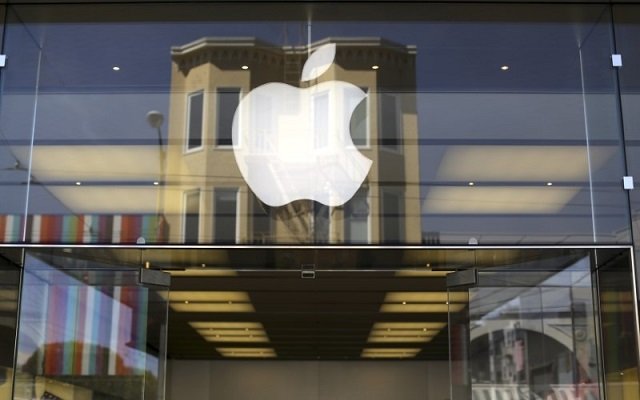 the apple logo is pictured on the front of a retail store in the marina neighborhood photo reuters