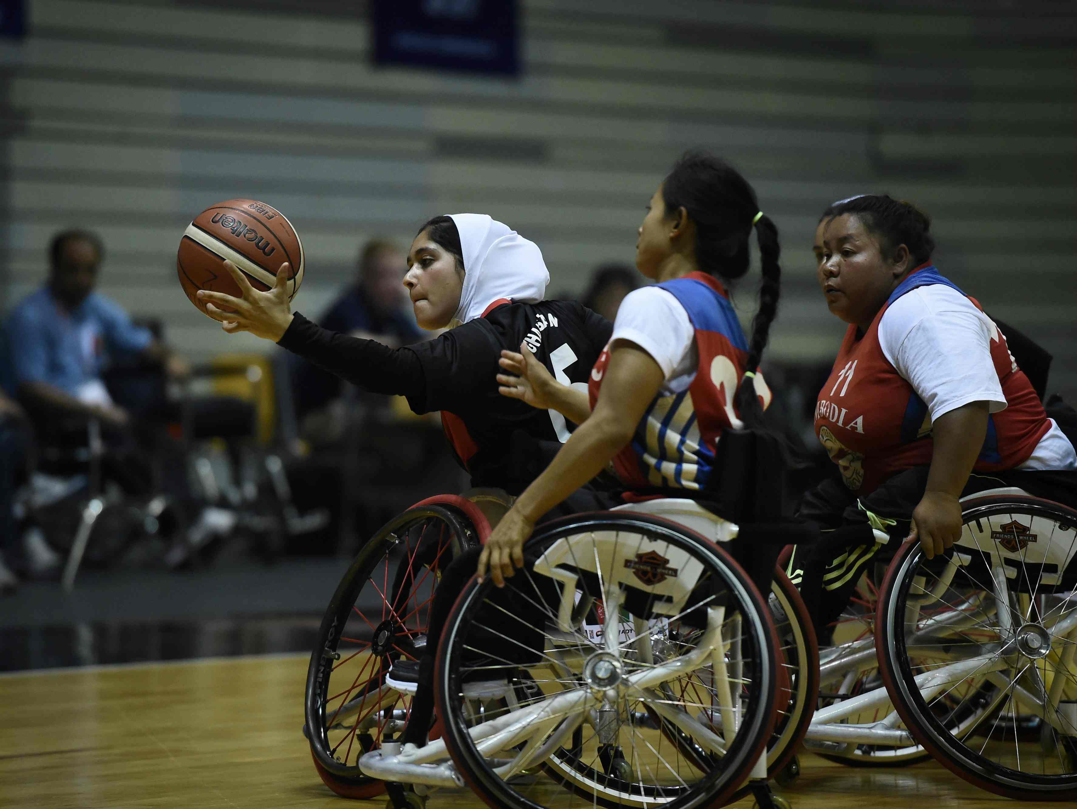 afghanistan s wheelchair basketballers shoot to win