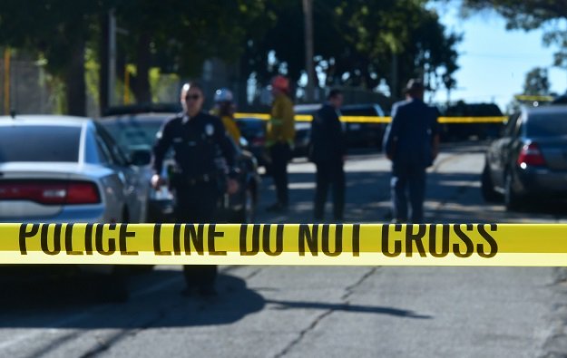 police guard a roadblock to salvadore castro middle school in los angeles california on february 1 2018 where two students were wounded one critically in a school shooting photo afp