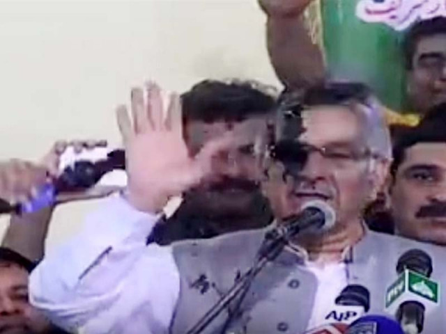 ink thrown at fm khawaja asif at workers convention in sialkot screengrab ink thrown at fm khawaja asif at workers convention in sialkot screengrab