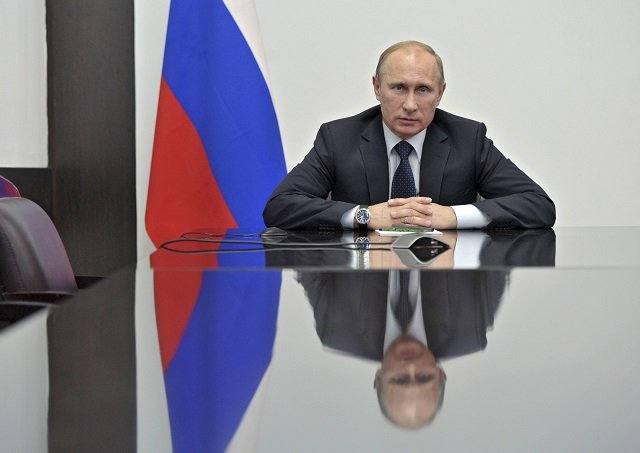 quot putin is a mirror and everyone can see in him what they want quot independent political analyst konstantin kalachev photo reuters