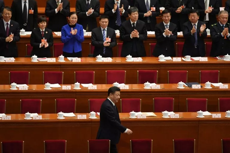 chinese president xi jinping was applauded as he arrived for the key vote at the national people s congress photo afp chinese president xi jinping was applauded as he arrived for the key vote at the national people s congress photo afp