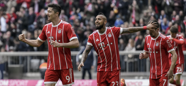 lewandowski l scored a hat trick and missed a penalty as he reached 100 bundesliga goals for bayern photo afp