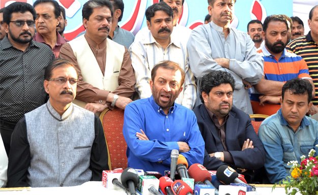 farooq sattar addressing press conference in hyderabad sitting on the right is kamran tessori photo inp