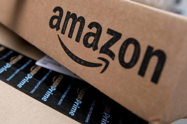 amazon boxes are seen stacked for delivery in the manhattan borough of new york city january 29 2016 photo reuters