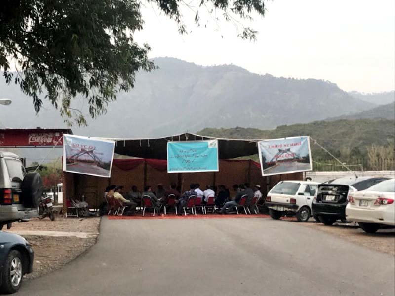 the parking lot for faculty at qau is vacant while protesting teachers stage a sit in at a camp in the varsity photo online express