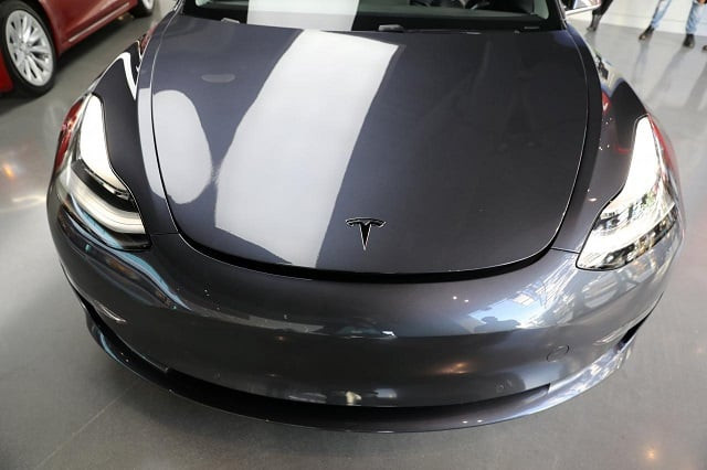 a tesla model 3 is seen in a showroom in los angeles california us january 12 2018 photo reuters a tesla model 3 is seen in a showroom in los angeles california us january 12 2018 photo reuters