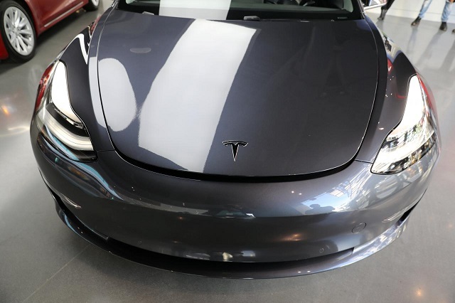 a tesla model 3 is seen in a showroom in los angeles california us january 12 2018 photo reuters