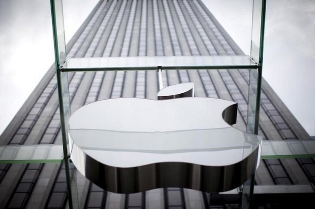 an apple logo hangs above the entrance to the apple store on 5th avenue in the manhattan borough of new york city july 21 2015 photo reuters