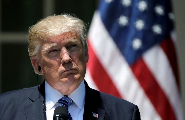 us president donald trump listens as south korean president moon jae in delivers a statement from the rose garden after meetings at the white house in washington us june 30 2017 photo reuters